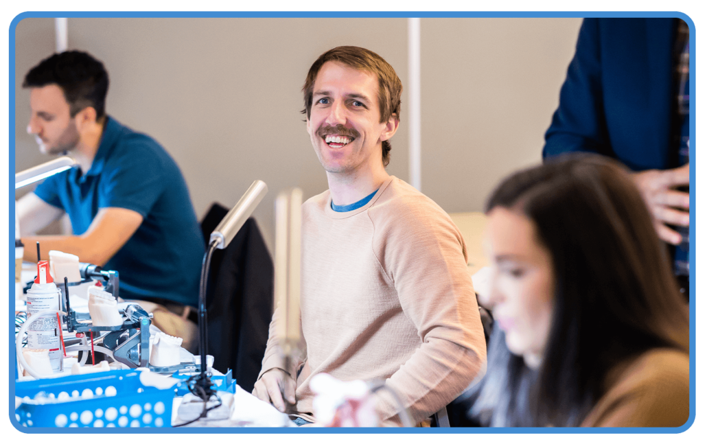 man smiles while attending Core 1, a dawson academy cours